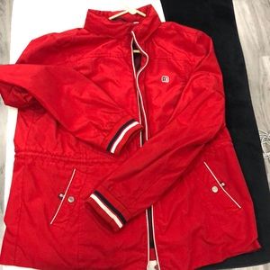 Tommy Hilfiger jacket size XL , zipper is functioning but kinda messed up